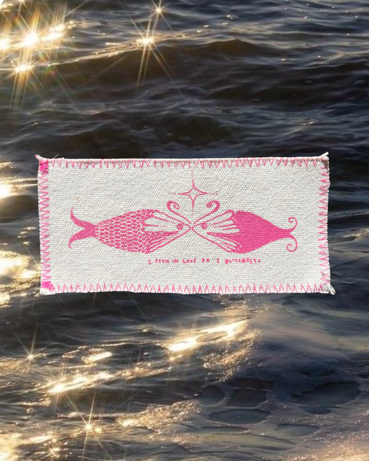 2 fish in love or 1 butterfly?